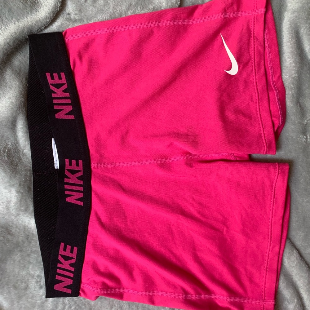 NIKE pros hot pink with black waistband